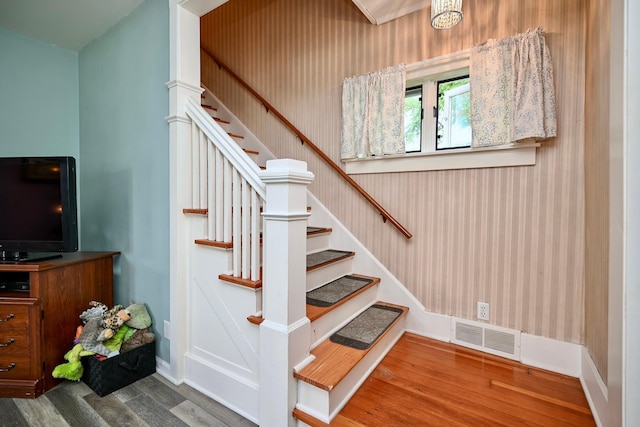 231 Mark St, Winona, MN 55987 - stairway featuring wood finished floors