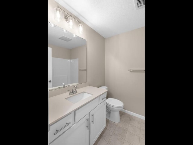 9773 32nd St NE, Saint Michael, MN 55376 - full bath featuring vanity, tile patterned floors, and a shower