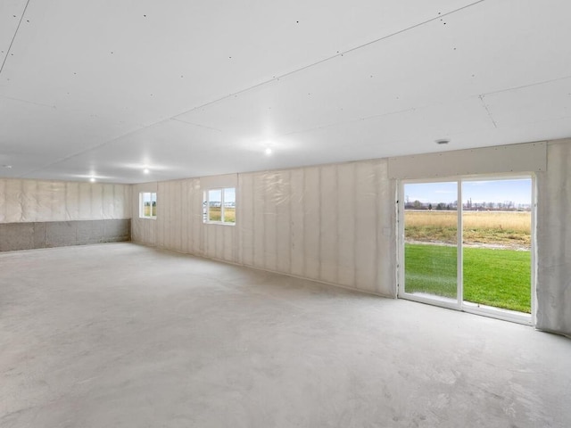 9773 32nd St NE, Saint Michael, MN 55376 - spare room featuring concrete floors
