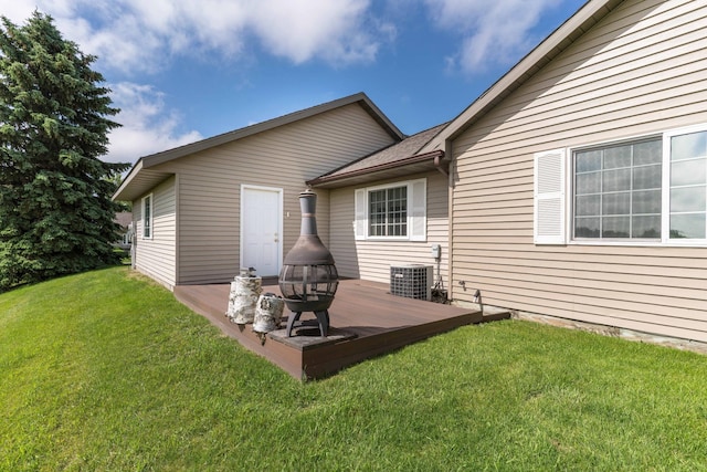 1715 Aspen Ln, Fergus Falls, MN 56537 - rear view of property with a deck and a lawn