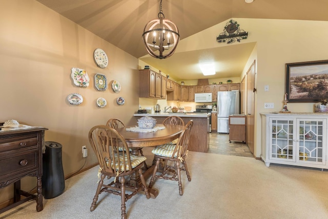 1715 Aspen Ln, Fergus Falls, MN 56537 - dining area with light carpet, vaulted ceiling, and a chandelier