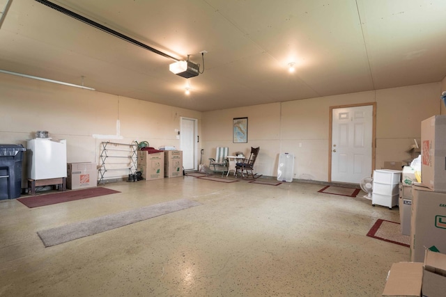 1715 Aspen Ln, Fergus Falls, MN 56537 - garage featuring a garage door opener
