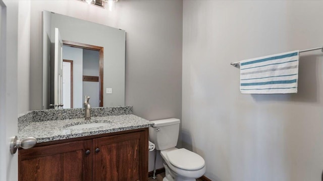 991 45th Ave NE, Saint Cloud, MN 56304 - half bathroom featuring toilet and vanity