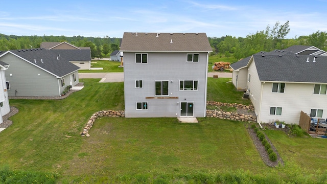 991 45th Ave NE, Saint Cloud, MN 56304 - rear view of property with a yard and a residential view