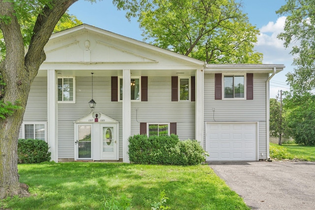 1315 Douglas Dr N, Golden Valley, MN 55422 - neoclassical / greek revival house with an attached garage, driveway, and a front lawn
