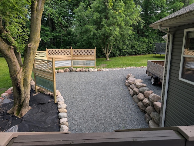 8240 Ochoa Ct NE, Otsego, MN 55330 - view of yard featuring a trampoline