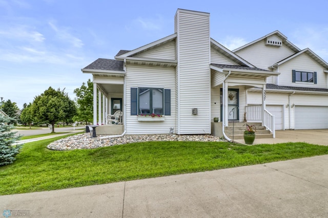 3327 23rd Ave S, Fargo, ND 58103 - view of front facade featuring concrete driveway, a front yard, a chimney, roof with shingles, and an attached garage