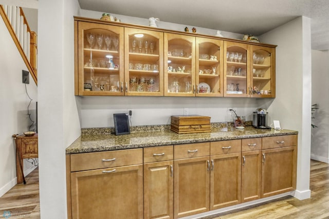 3327 23rd Ave S, Fargo, ND 58103 - bar area with light wood-type flooring and baseboards