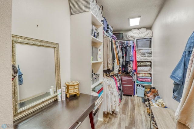 3327 23rd Ave S, Fargo, ND 58103 - walk in closet featuring wood finished floors