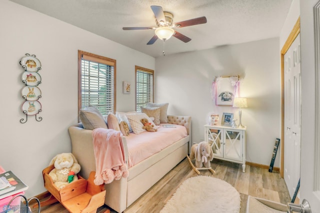 3327 23rd Ave S, Fargo, ND 58103 - bedroom with wood finished floors and ceiling fan