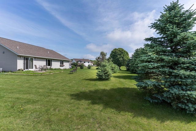 603 7th Ave, Osakis, MN 56360 - view of green lawn featuring a patio