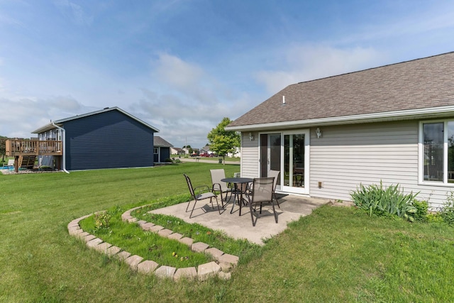 603 7th Ave, Osakis, MN 56360 - view of green lawn featuring a patio