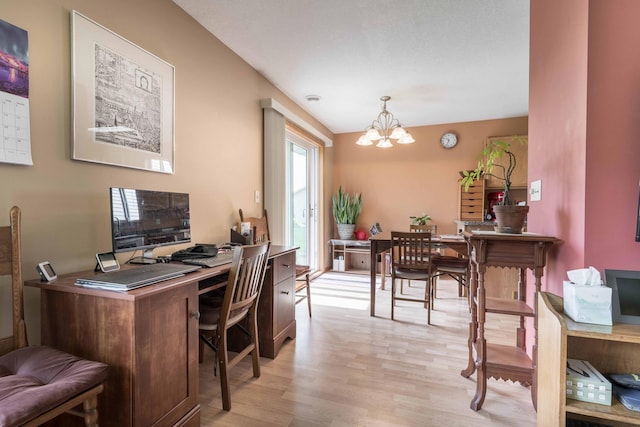 603 7th Ave, Osakis, MN 56360 - home office with light wood-type flooring and a chandelier