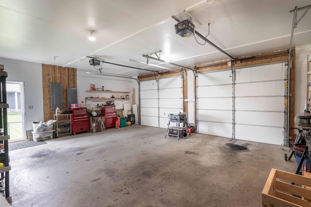 603 7th Ave, Osakis, MN 56360 - garage featuring electric panel and a garage door opener