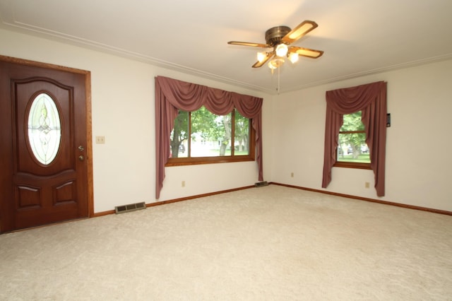 842 19th Ave N, Saint Cloud, MN 56303 - foyer entrance featuring a ceiling fan and light carpet