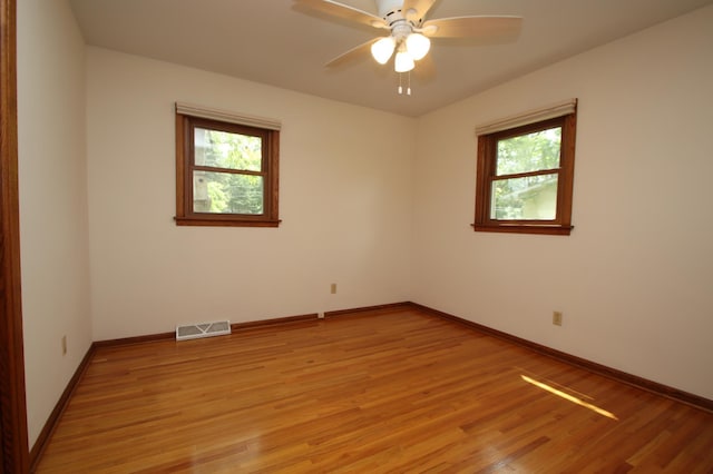 842 19th Ave N, Saint Cloud, MN 56303 - empty room featuring healthy amount of natural light and light wood-style flooring