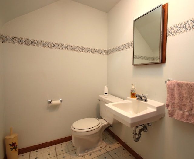 842 19th Ave N, Saint Cloud, MN 56303 - bathroom featuring tile patterned floors and vaulted ceiling