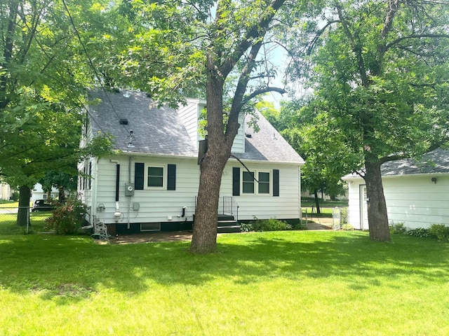 842 19th Ave N, Saint Cloud, MN 56303 - rear view of house featuring a shingled roof