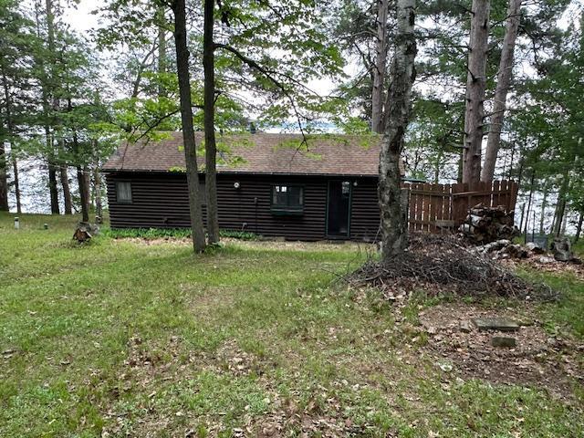 20519 485th St, Mcgregor, MN 55760 - rear view of property with log veneer siding