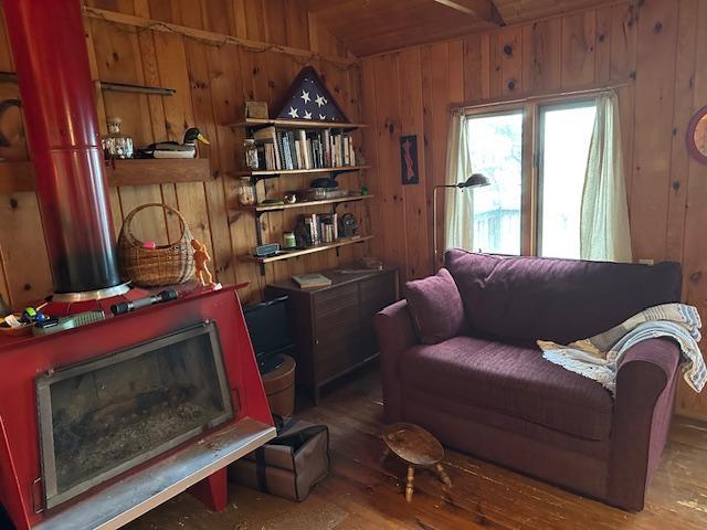 20519 485th St, Mcgregor, MN 55760 - living area with wooden walls, wood finished floors, and wood ceiling