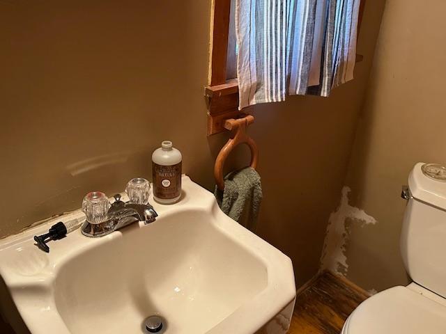 20519 485th St, Mcgregor, MN 55760 - half bath featuring a sink and toilet