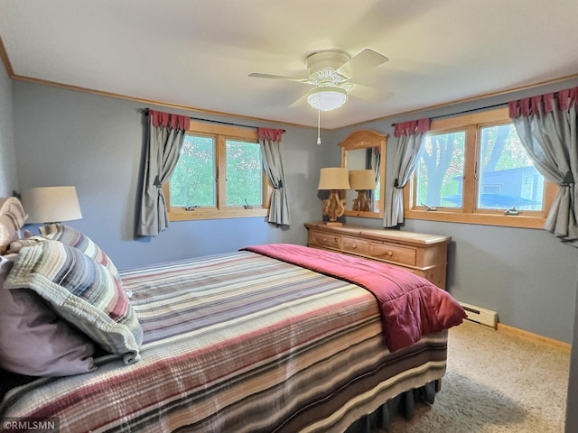 8243 Greer Ave NW, Maple Lake, MN 55358 - carpeted bedroom featuring a baseboard radiator and ceiling fan