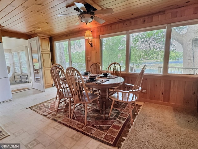8243 Greer Ave NW, Maple Lake, MN 55358 - dining area featuring wooden walls, ceiling fan, and wood ceiling