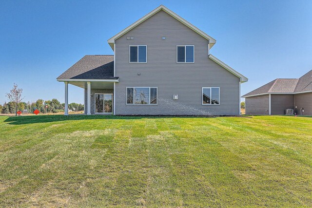 3483 Kady Ave NE, Saint Michael, MN 55376 - rear view of property with a yard