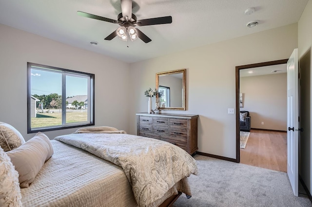 3483 Kady Ave NE, Saint Michael, MN 55376 - bedroom with light colored carpet and ceiling fan