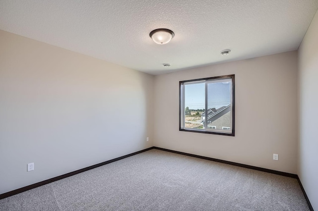 3483 Kady Ave NE, Saint Michael, MN 55376 - carpeted spare room with a textured ceiling and baseboards