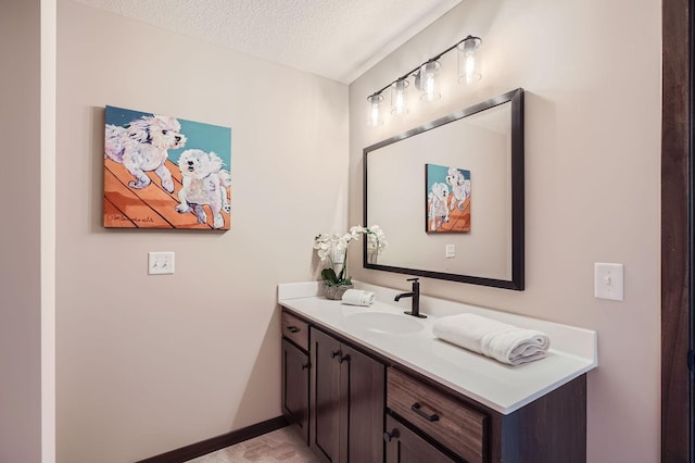 3483 Kady Ave NE, Saint Michael, MN 55376 - bathroom with vanity and a textured ceiling