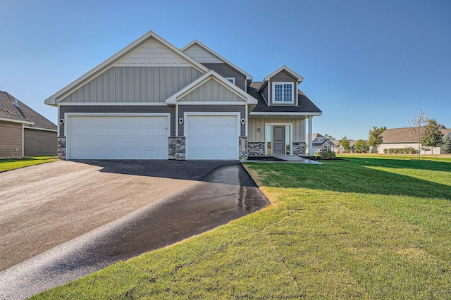 3483 Kady Ave NE, Saint Michael, MN 55376 - craftsman inspired home with driveway, board and batten siding, stone siding, a front lawn, and an attached garage