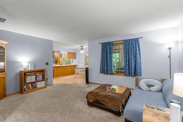 505 Brookview Ln SW, Isanti, MN 55040 - living room with light colored carpet, ceiling fan, and a textured ceiling