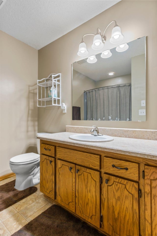 505 Brookview Ln SW, Isanti, MN 55040 - bathroom featuring vanity, tile patterned flooring, a textured ceiling, and a shower with shower curtain