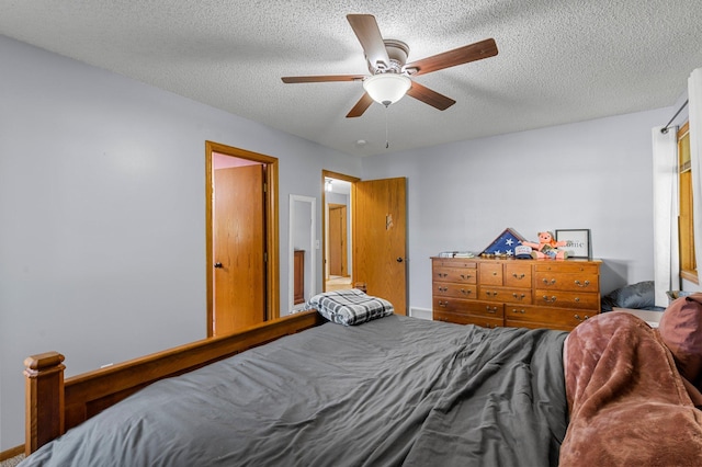 505 Brookview Ln SW, Isanti, MN 55040 - bedroom with a textured ceiling and a ceiling fan