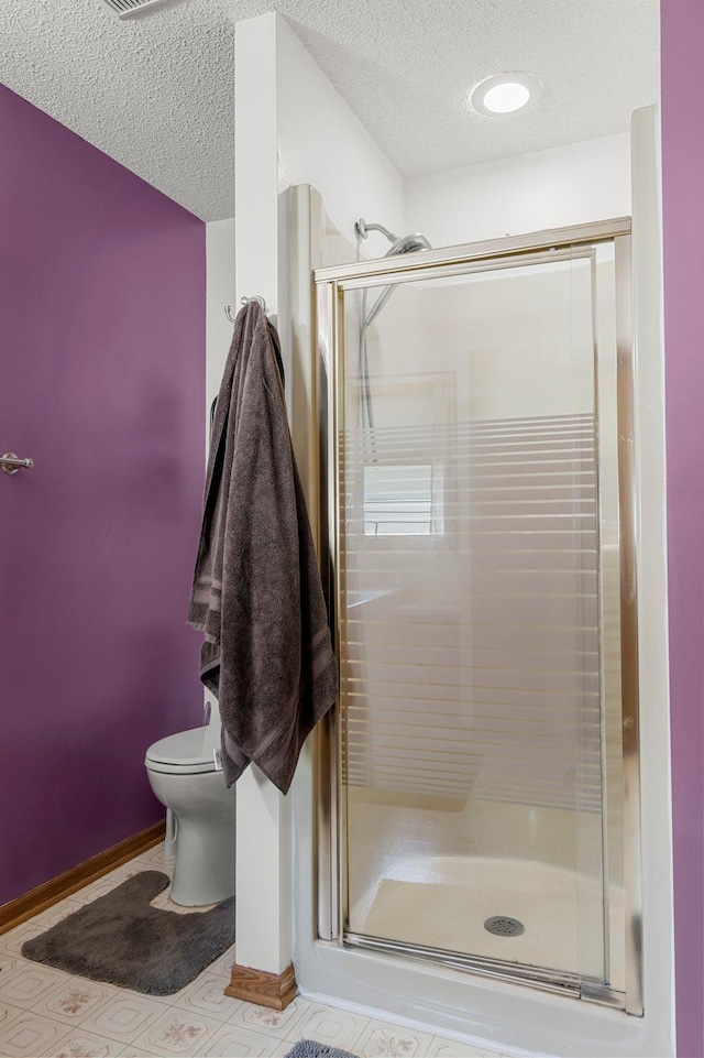 505 Brookview Ln SW, Isanti, MN 55040 - bathroom featuring a shower stall and a textured ceiling