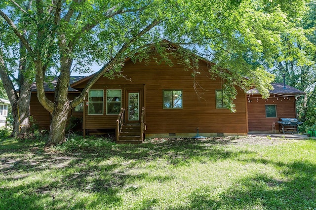 505 Brookview Ln SW, Isanti, MN 55040 - view of home's exterior with a lawn, crawl space, and entry steps