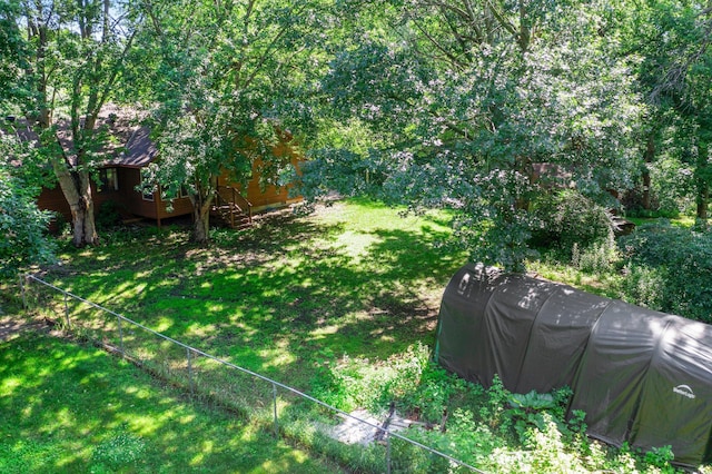 505 Brookview Ln SW, Isanti, MN 55040 - view of grassy yard featuring a deck