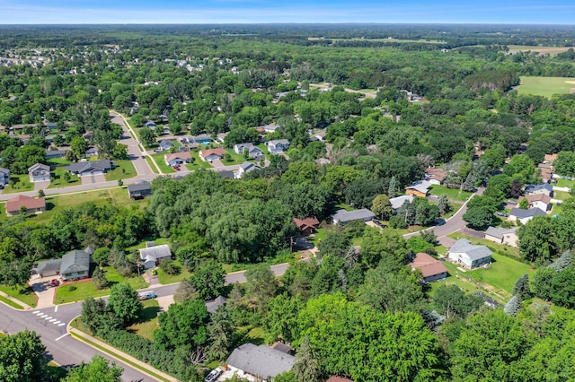 505 Brookview Ln SW, Isanti, MN 55040 - aerial perspective of suburban area with a heavily wooded area