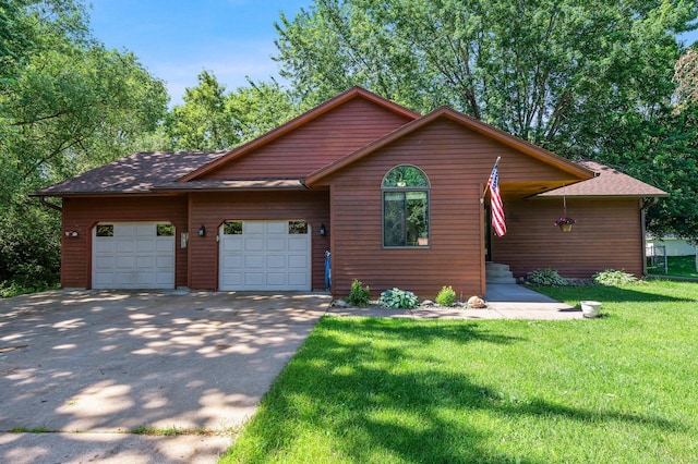 505 Brookview Ln SW, Isanti, MN 55040 - view of front of home featuring driveway, an attached garage, and a front lawn