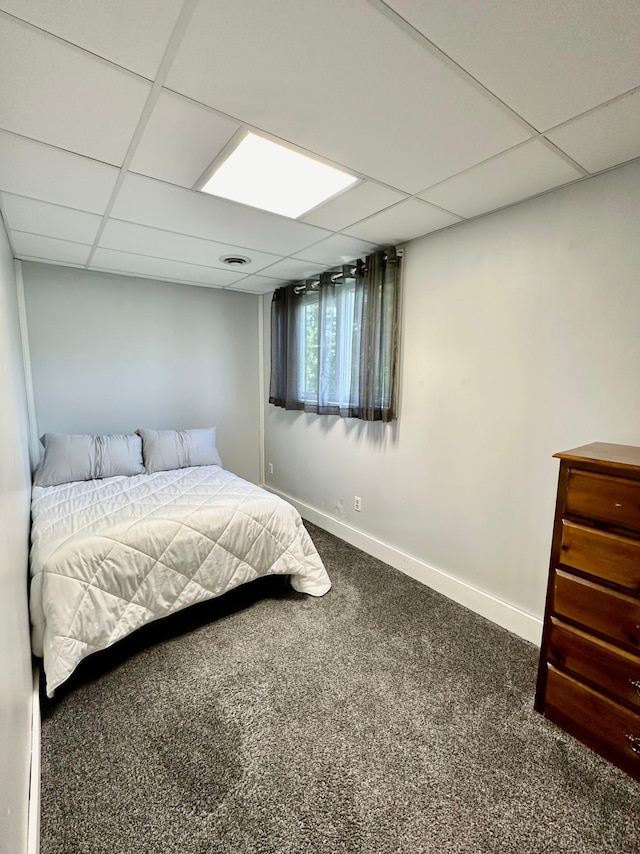 5735 County Road 1, Littlefork, MN 56653 - carpeted bedroom featuring a paneled ceiling and baseboards