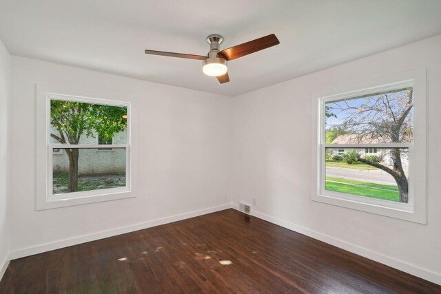 242 Butler Ave W, West Saint Paul, MN 55118 - spare room featuring dark wood finished floors and a ceiling fan