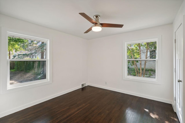 242 Butler Ave W, West Saint Paul, MN 55118 - unfurnished room with dark wood-style flooring and ceiling fan