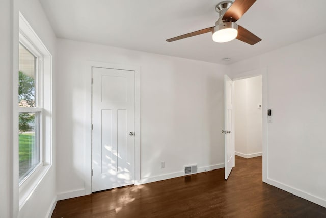 242 Butler Ave W, West Saint Paul, MN 55118 - spare room with healthy amount of natural light, a ceiling fan, and dark wood-style floors