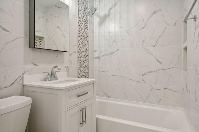 242 Butler Ave W, West Saint Paul, MN 55118 - bathroom featuring vanity, bathtub / shower combination, and tile walls