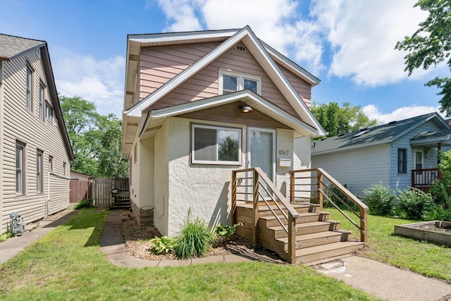 1067 Van Buren Ave, Saint Paul, MN 55104 - view of front of house featuring stucco siding