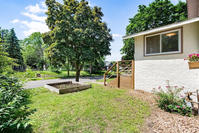 1067 Van Buren Ave, Saint Paul, MN 55104 - view of yard with a vegetable garden