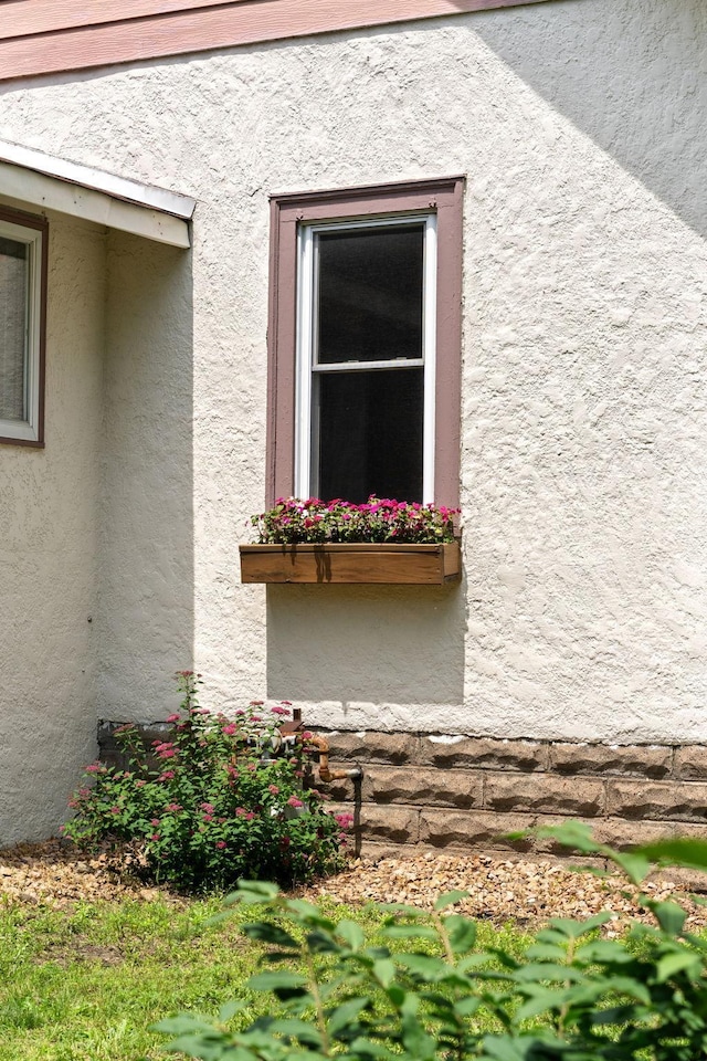 1067 Van Buren Ave, Saint Paul, MN 55104 - view of home's exterior with stucco siding