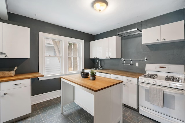 1067 Van Buren Ave, Saint Paul, MN 55104 - kitchen featuring wood counters, white gas range, and white cabinetry