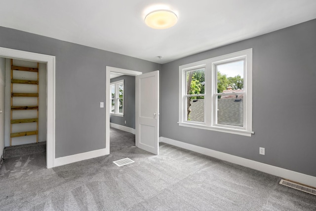 1067 Van Buren Ave, Saint Paul, MN 55104 - unfurnished bedroom with baseboards and carpet flooring